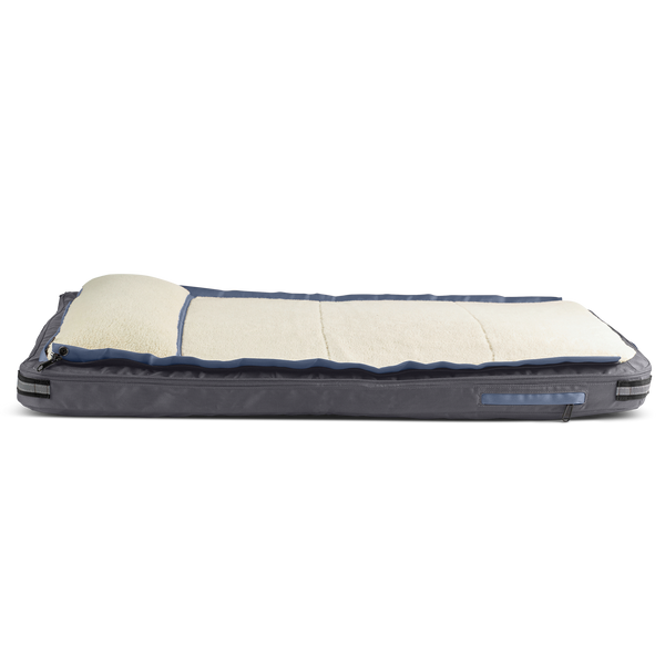 Side view of medium dog bed, gray, with light blue trim, black accents, and cream colored fleece, dog beds for large dogs, best dog beds for small dogs
